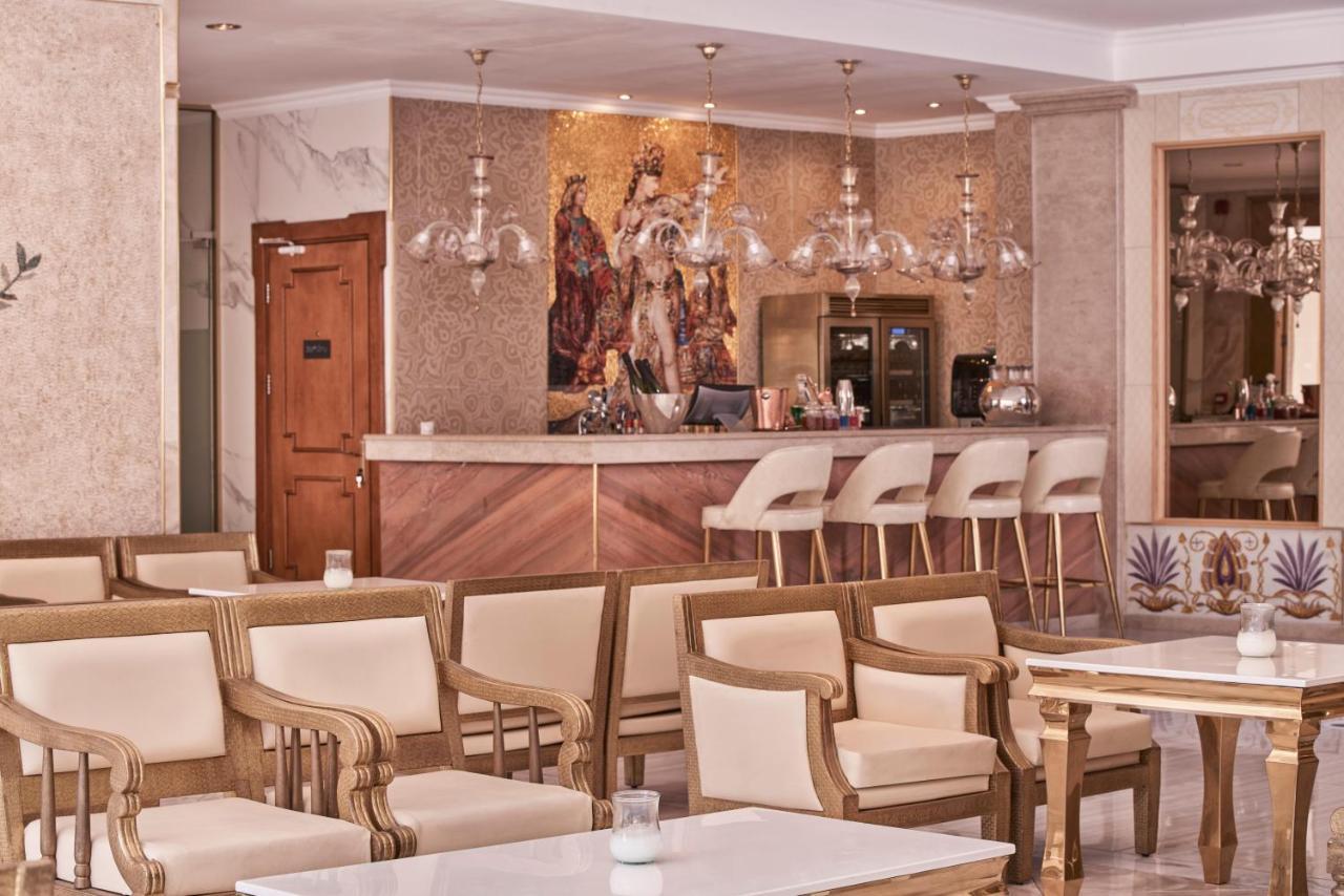 Kairaba Mythos Palace - Adults Only Kouspádhes Exterior foto The bar at the hotel